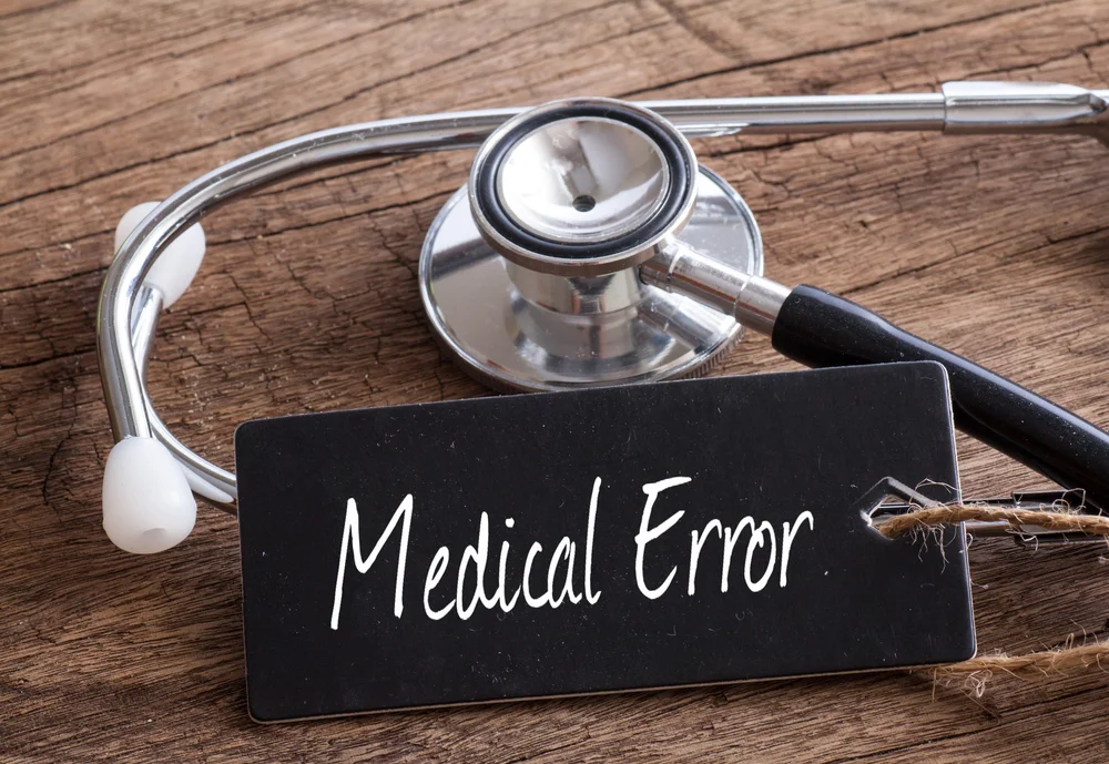 a stethoscope and a tag with a message / What to Do When Medication Goes Wrong: A Simple Guide for Families, Carers, and Managers / Common Medication Errors / What to Do When Medication Goes Wrong / What Managers Should Do When Medication Errors Occur / How to Prevent Medication Errors in the Future / Handling Medication Mistakes with Confidence / Pharmacy CareRX in Florida