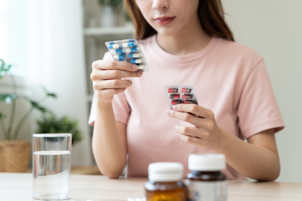 Close-Up Hands Holding Medication