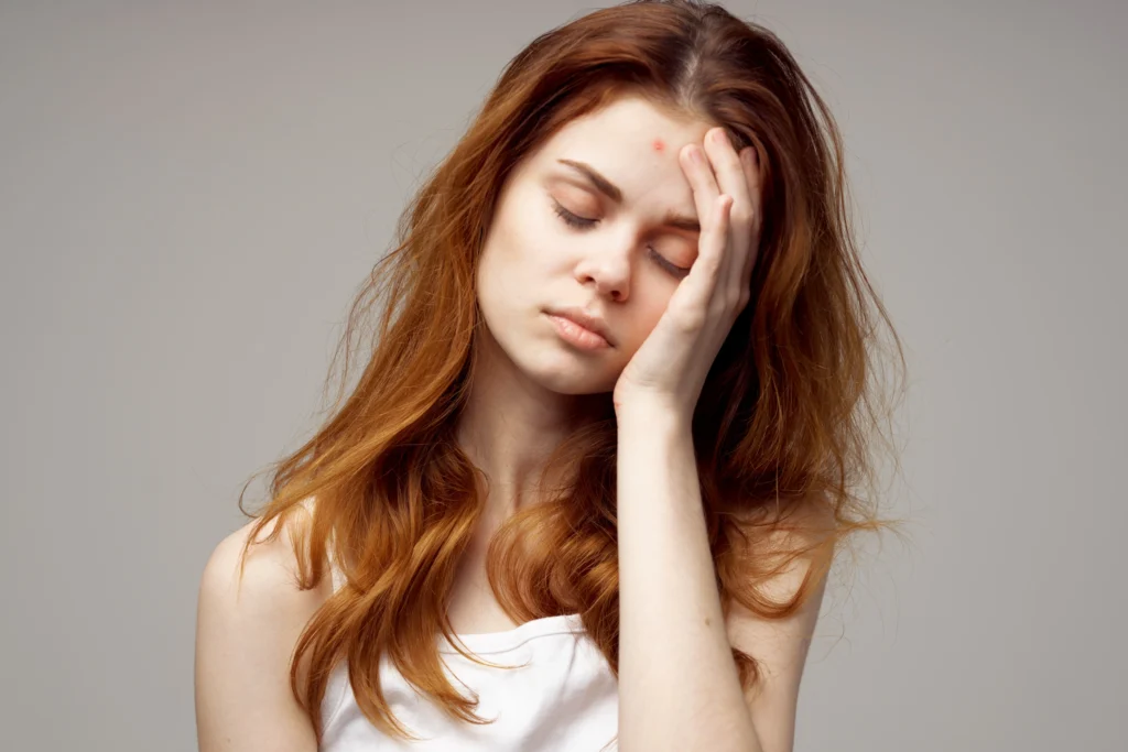 a woman facing dizziness because she missed a a Dose of Methylprednisolone