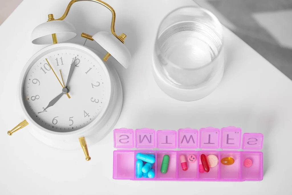 Alarm clock and a pill organiser to avoid Missing a Dose of Mounjaro
