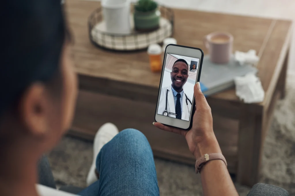 A woman contacting a doctor on video call to avoid Side Effects of Missing a Dose of Wellbutrin
