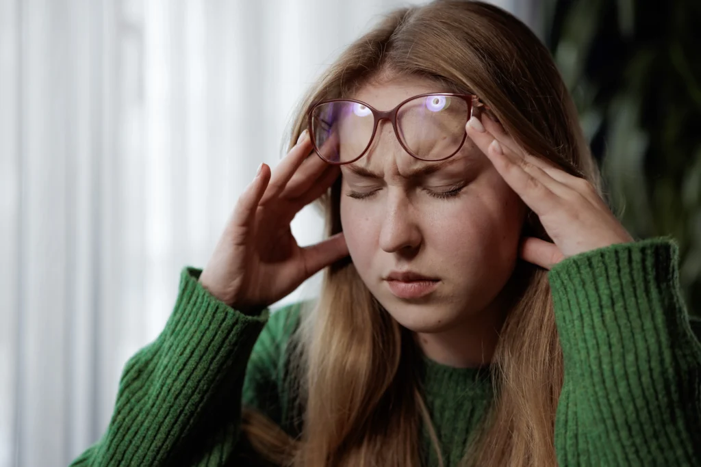 A woman experiencing Nausea due to Side Effects of Missing a Dose of Cymbalta