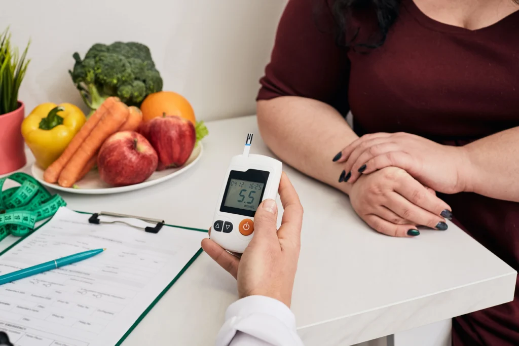 A doctor checking blood sugar of a Patient to monitor side effects of missing a dose of zepbound.