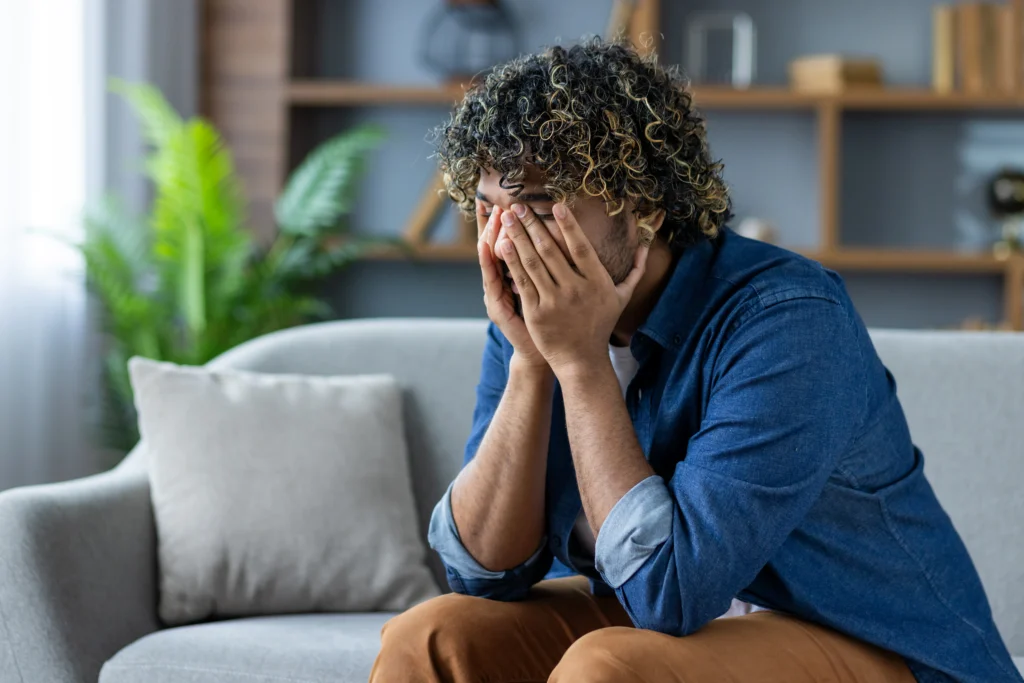 A man experiencing anxiety due to side effects of missing a dose of Prozac