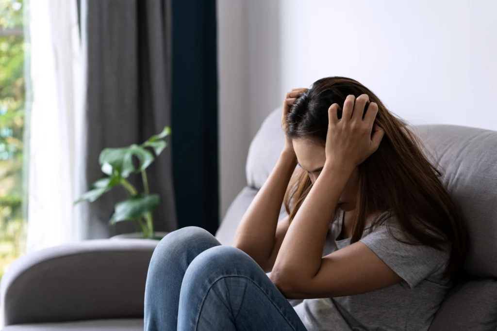 A woman experiencing increased anxiety dut to repeatedly missing Dose of Sertraline.
