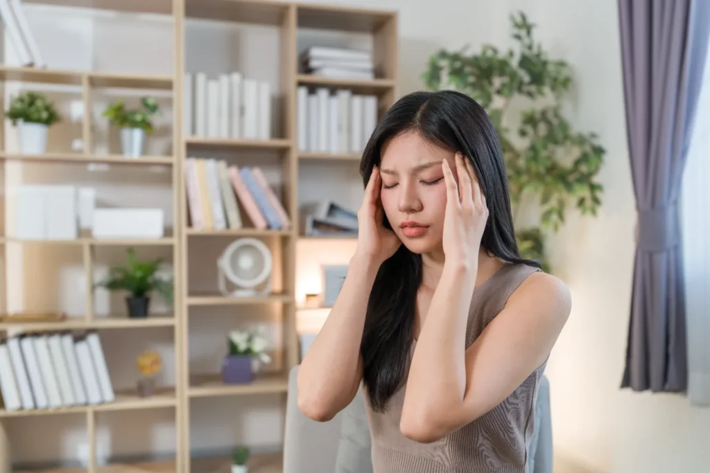 A woman experience dizziness due to Side Effects of taking Mirtazapine